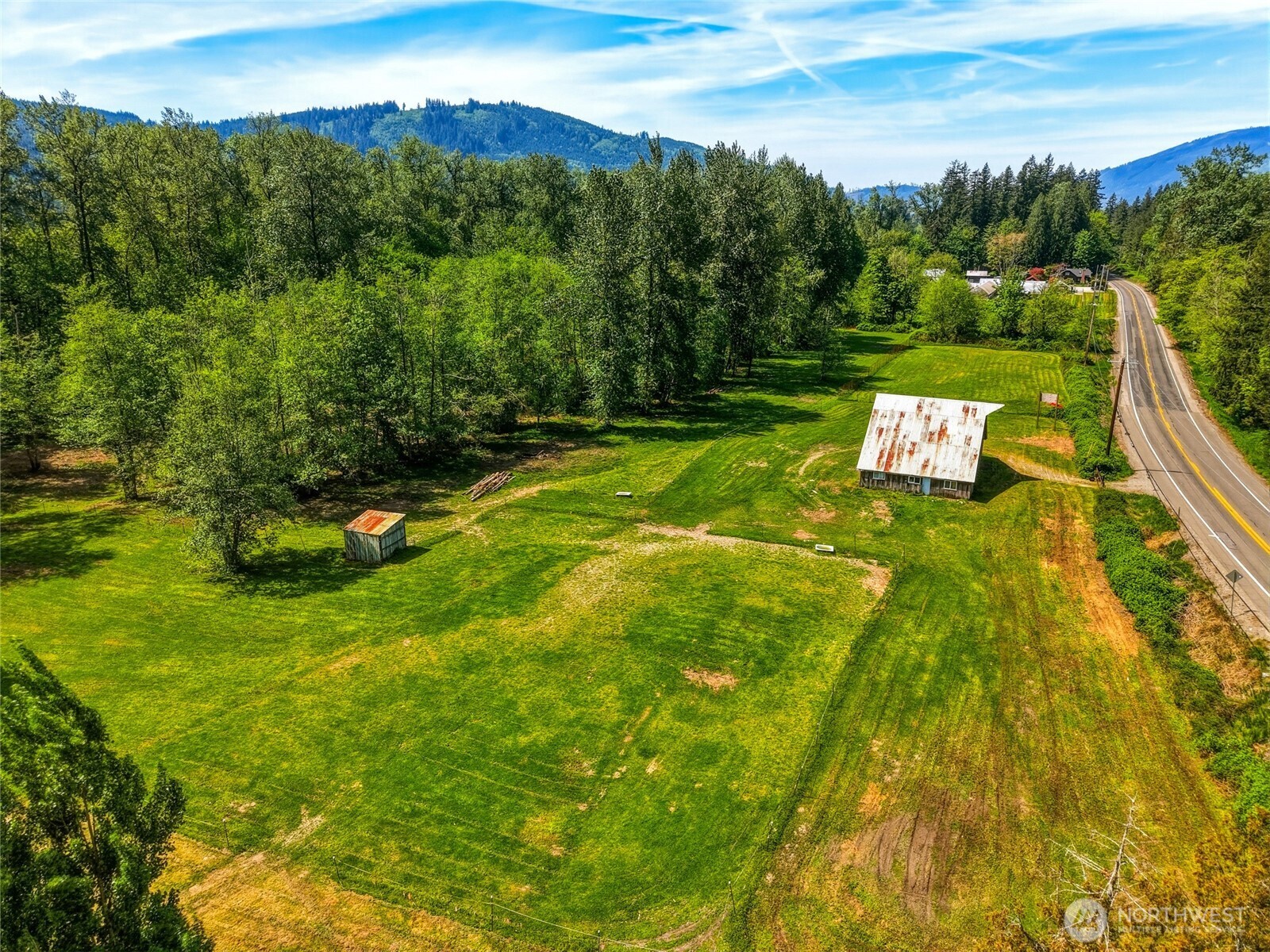 21716 State Rte 530 Northeast Arlington, WA 98223 - Photo 34 of 38 a view of a golf course with a garden