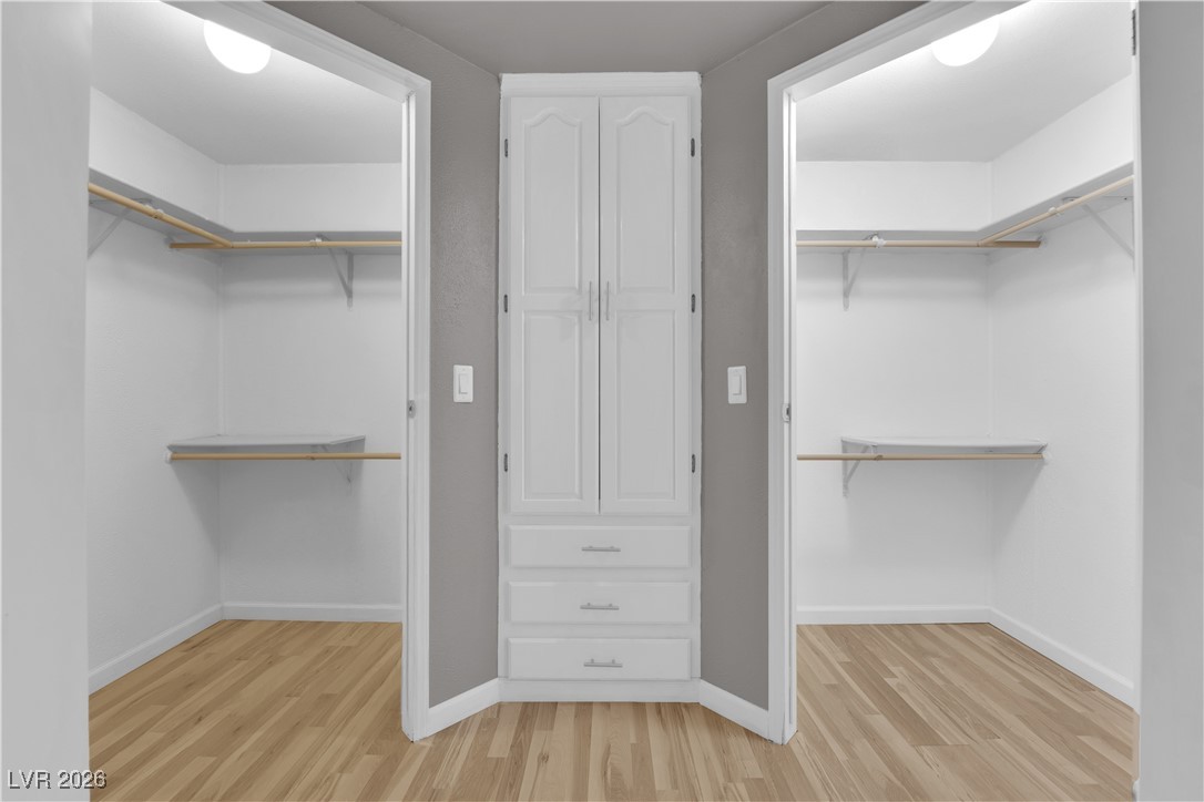 5550 Vicki Ann Road Pahrump, NV 89048 - Photo 19 of 44 Walk in closet with light wood finished floors