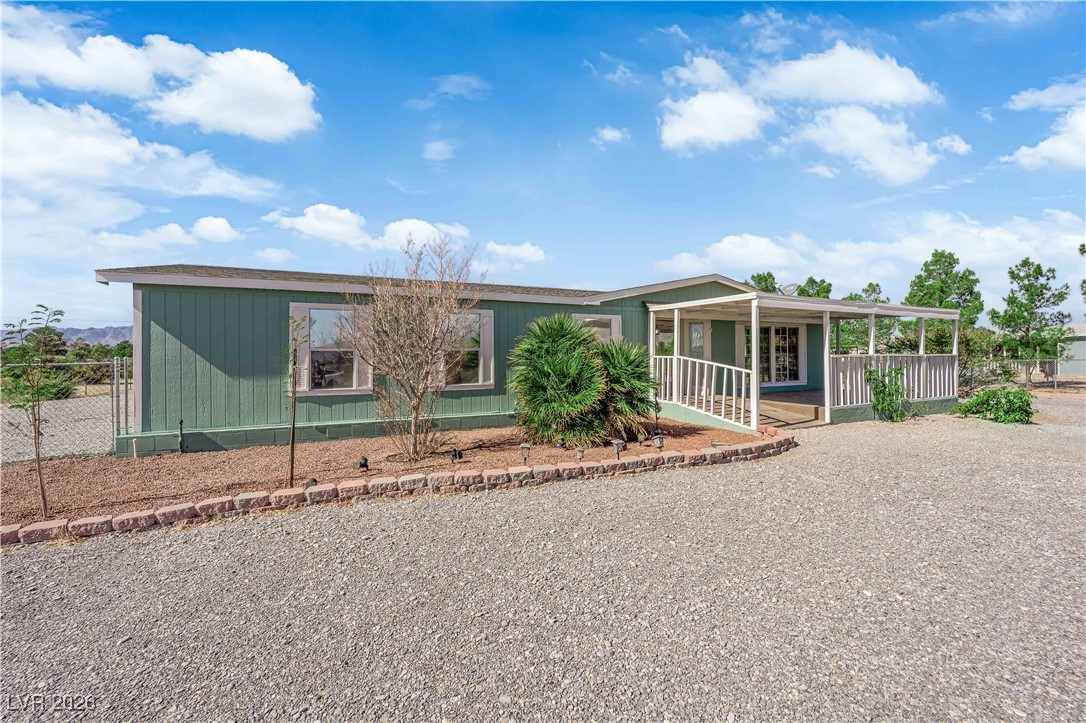 5550 Vicki Ann Road Pahrump, NV 89048 - Photo 40 of 44 Manufactured / mobile home with covered porch