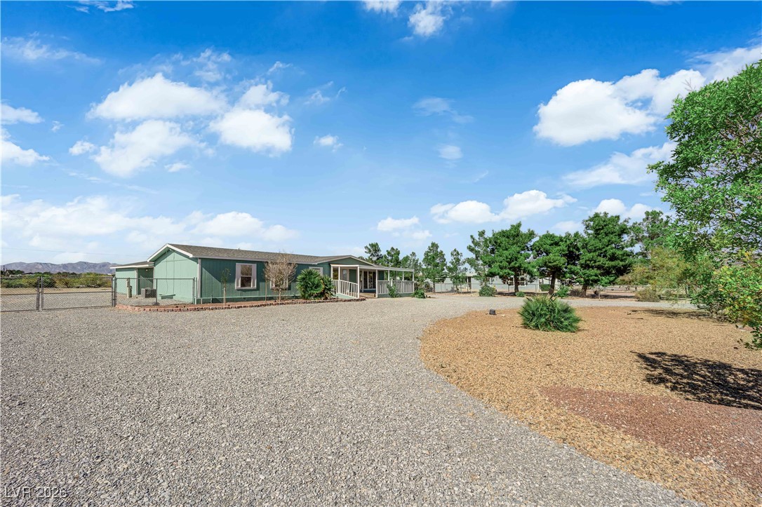 5550 Vicki Ann Road Pahrump, NV 89048 - Photo 41 of 44 View of front of home featuring driveway