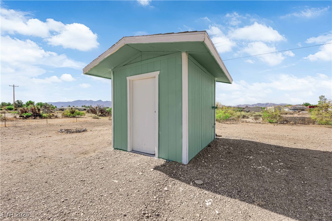 5550 Vicki Ann Road Pahrump, NV 89048 - Photo 7 of 44 View of shed with a mountain view