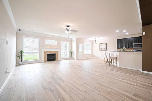 a view of a kitchen with furniture and a fireplace