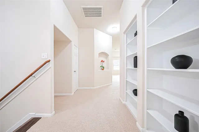 a view of a livingroom with wooden floor