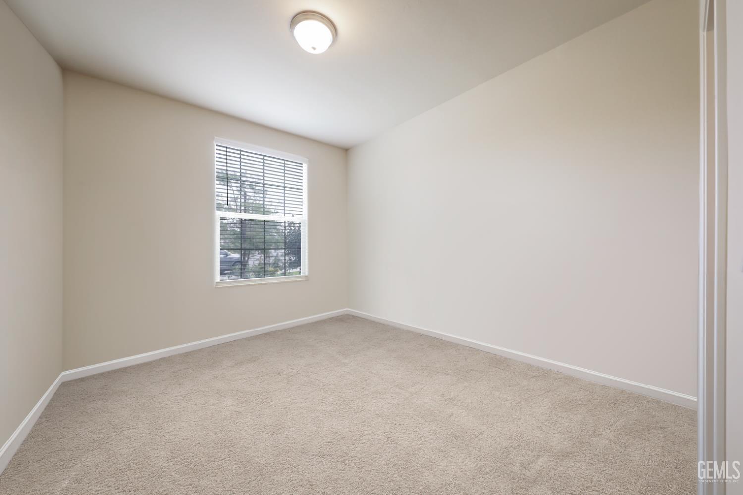 Undisclosed Address Shafter, CA 93263 - Photo 17 of 28 an empty room with a window