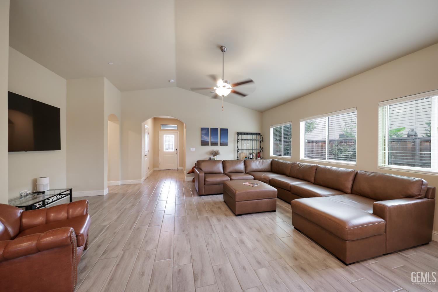 Undisclosed Address Shafter, CA 93263 - Photo 9 of 28 a living room with furniture and a flat screen tv