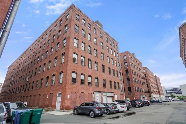 a view of a building with a street