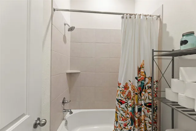 a room with window and cabinets