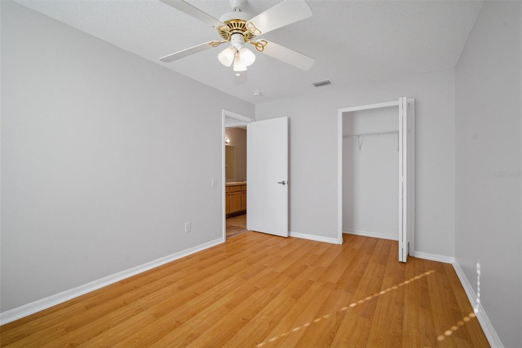 12407 Dawn Vista Drive Riverview, FL 33578 - Photo 16 of 44 a view of a room with a ceiling fan