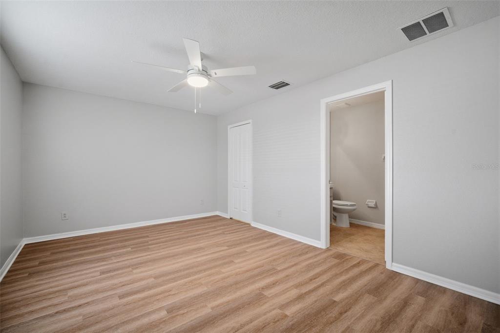 12407 Dawn Vista Drive Riverview, FL 33578 - Photo 22 of 44 wooden floor in an empty room