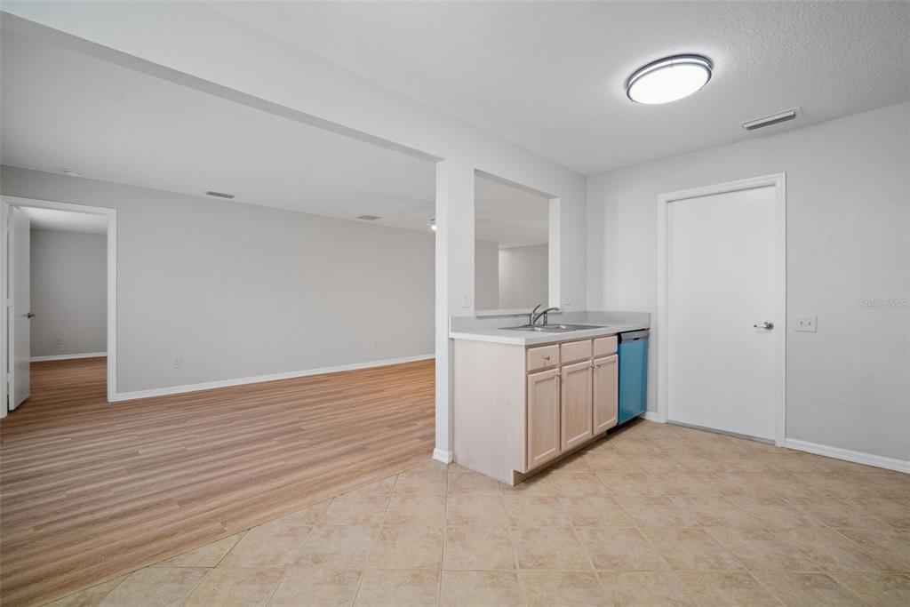 12407 Dawn Vista Drive Riverview, FL 33578 - Photo 29 of 44 a room with a stove and a sink