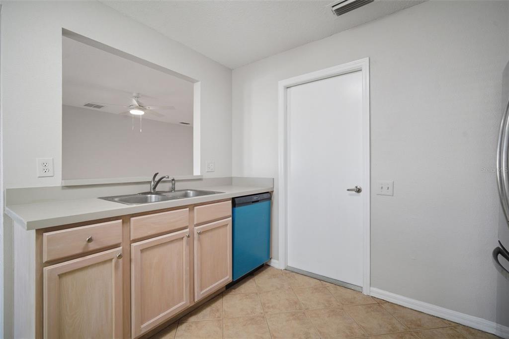 12407 Dawn Vista Drive Riverview, FL 33578 - Photo 32 of 44 a bathroom with a granite countertop sink and a mirror