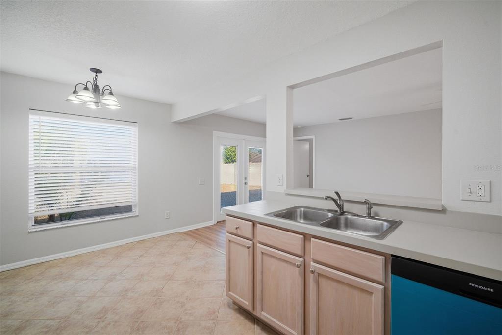 12407 Dawn Vista Drive Riverview, FL 33578 - Photo 33 of 44 a bathroom with a sink and a window