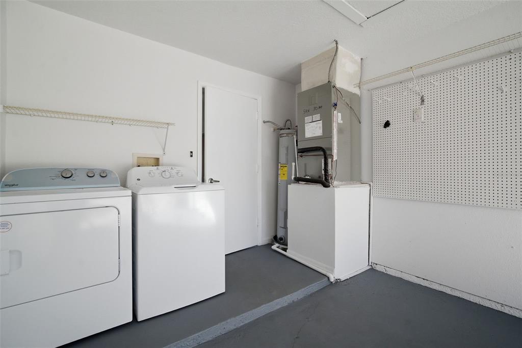 12407 Dawn Vista Drive Riverview, FL 33578 - Photo 40 of 44 a room with storage and utility