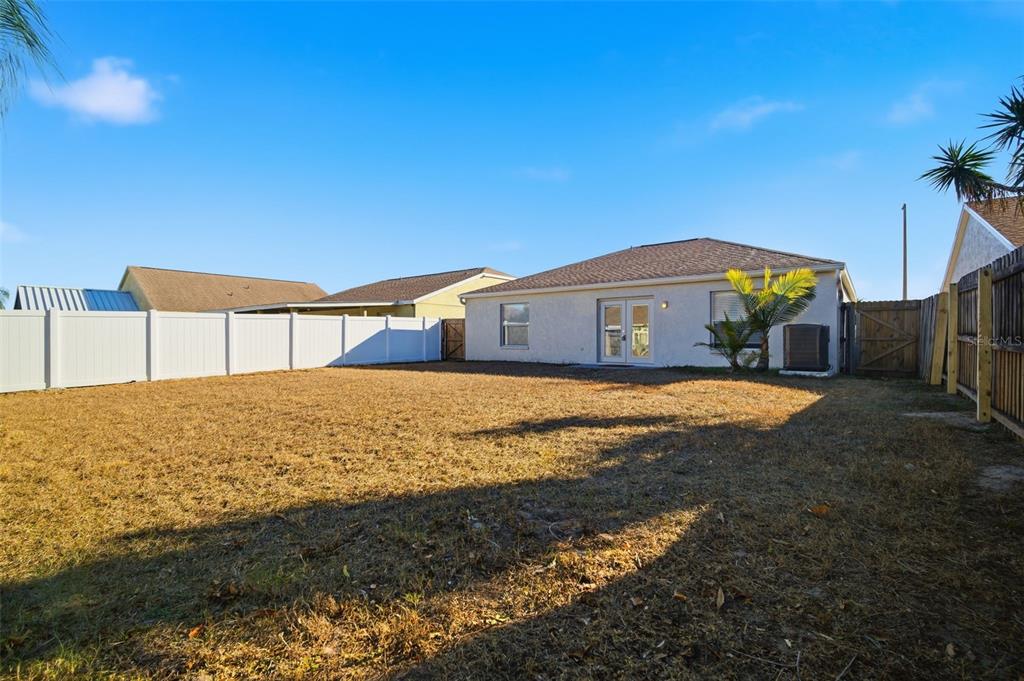 12407 Dawn Vista Drive Riverview, FL 33578 - Photo 42 of 44 a view of a house with a yard