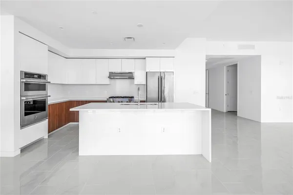 a view of work space with cabinets