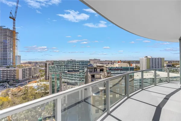 a living room with furniture and flat screen tv