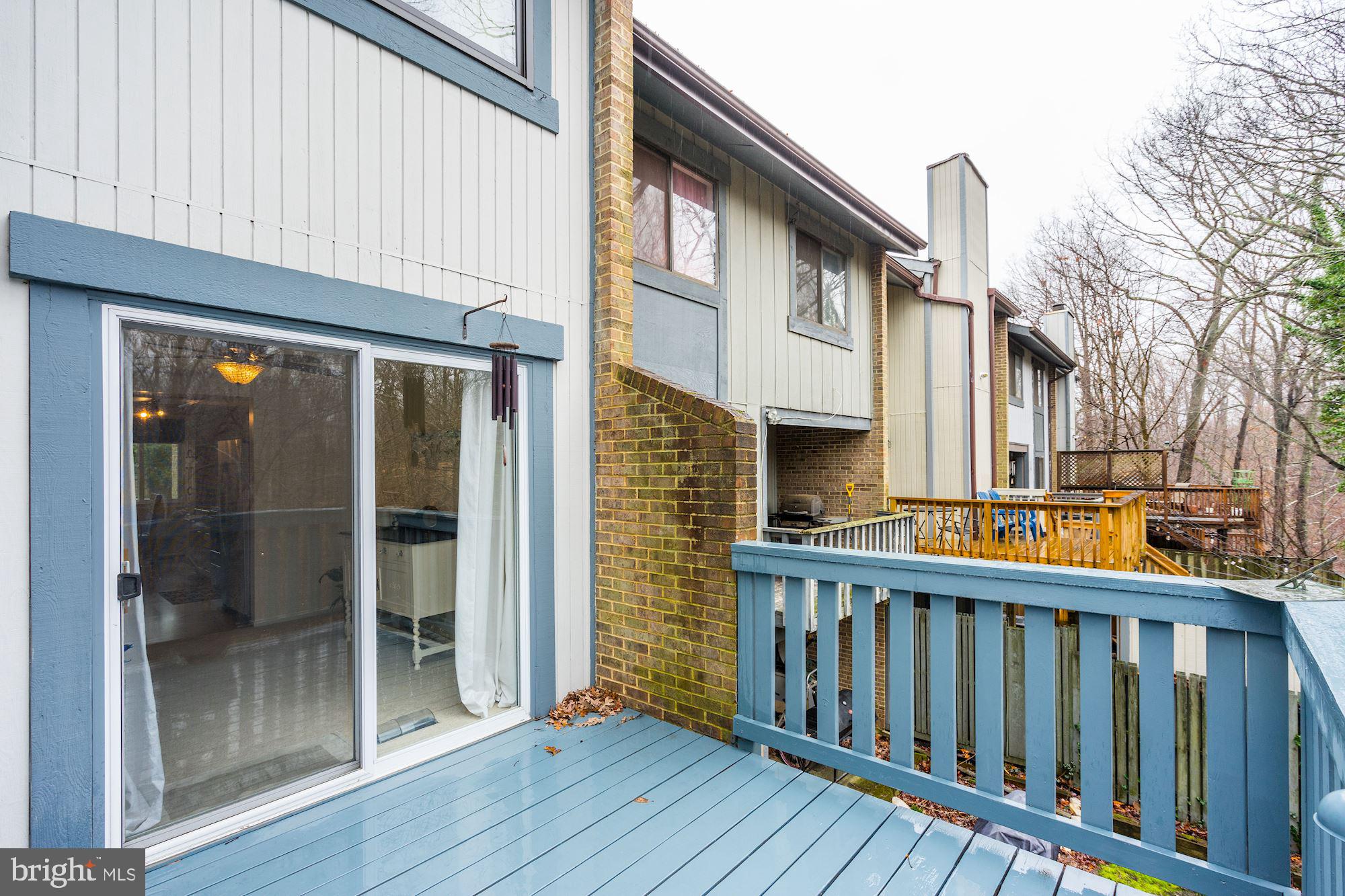 8552 Gwynedd Way Springfield, VA 22153 - Photo 11 of 37 Main level balcony backs to woods and stream!