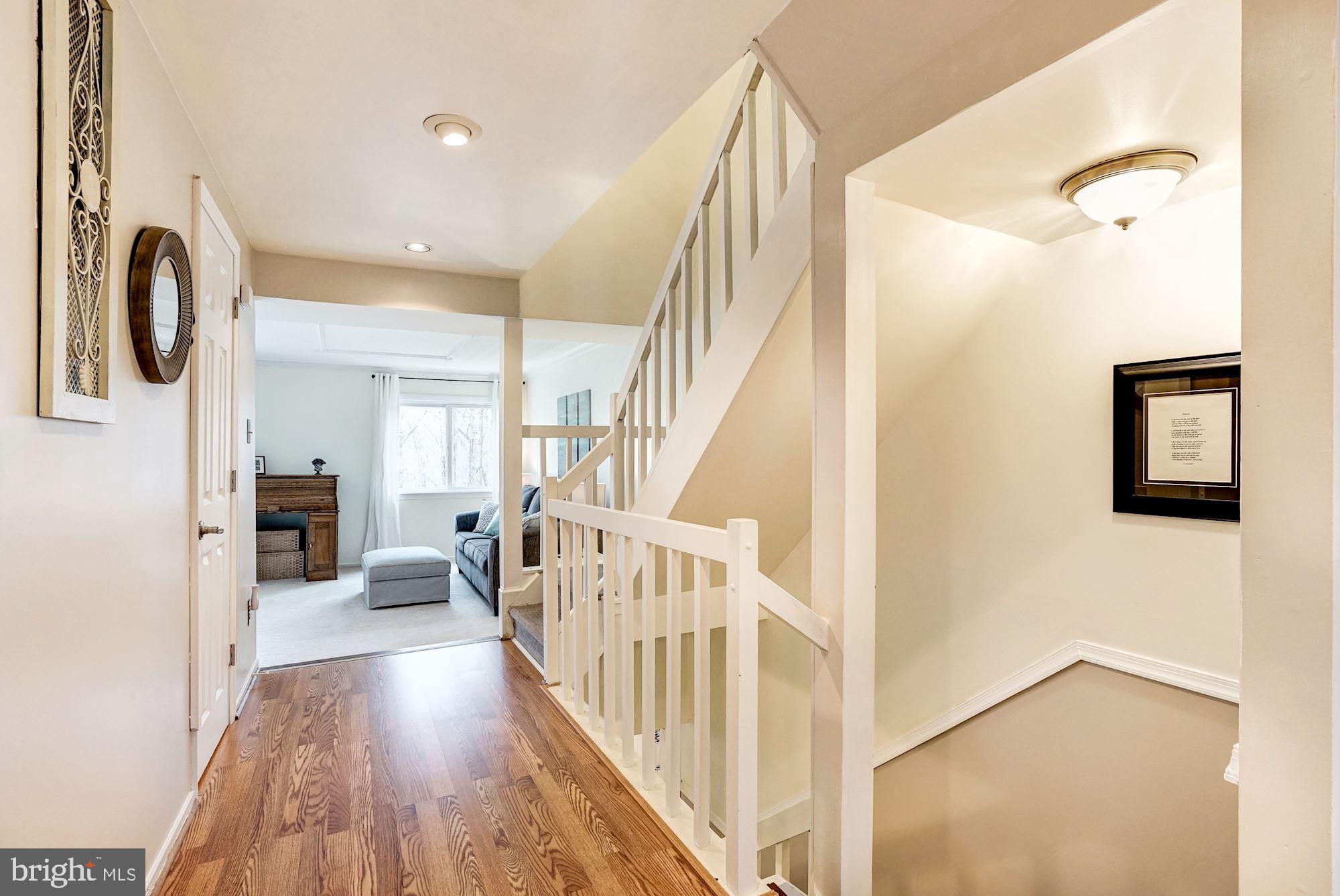 8552 Gwynedd Way Springfield, VA 22153 - Photo 17 of 37 Main level hallway and access to upper/lower level