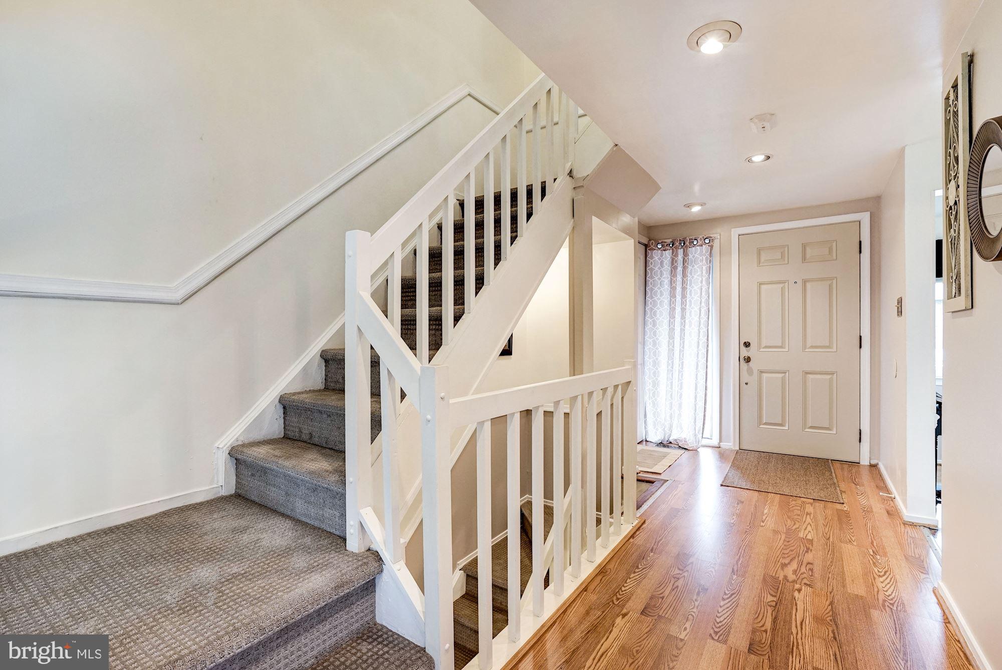 8552 Gwynedd Way Springfield, VA 22153 - Photo 25 of 37 Main level entrance and stairs to upper level