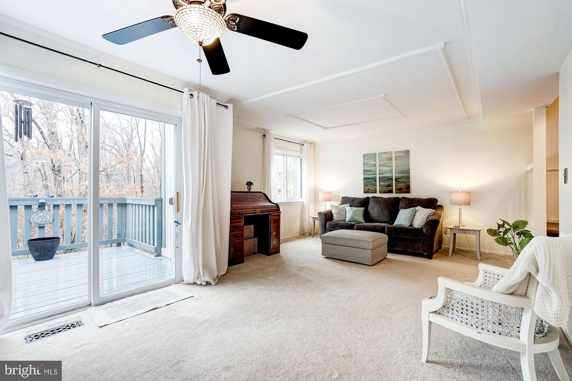 8552 Gwynedd Way Springfield, VA 22153 - Photo 6 of 37 Living room with access to deck/balcony