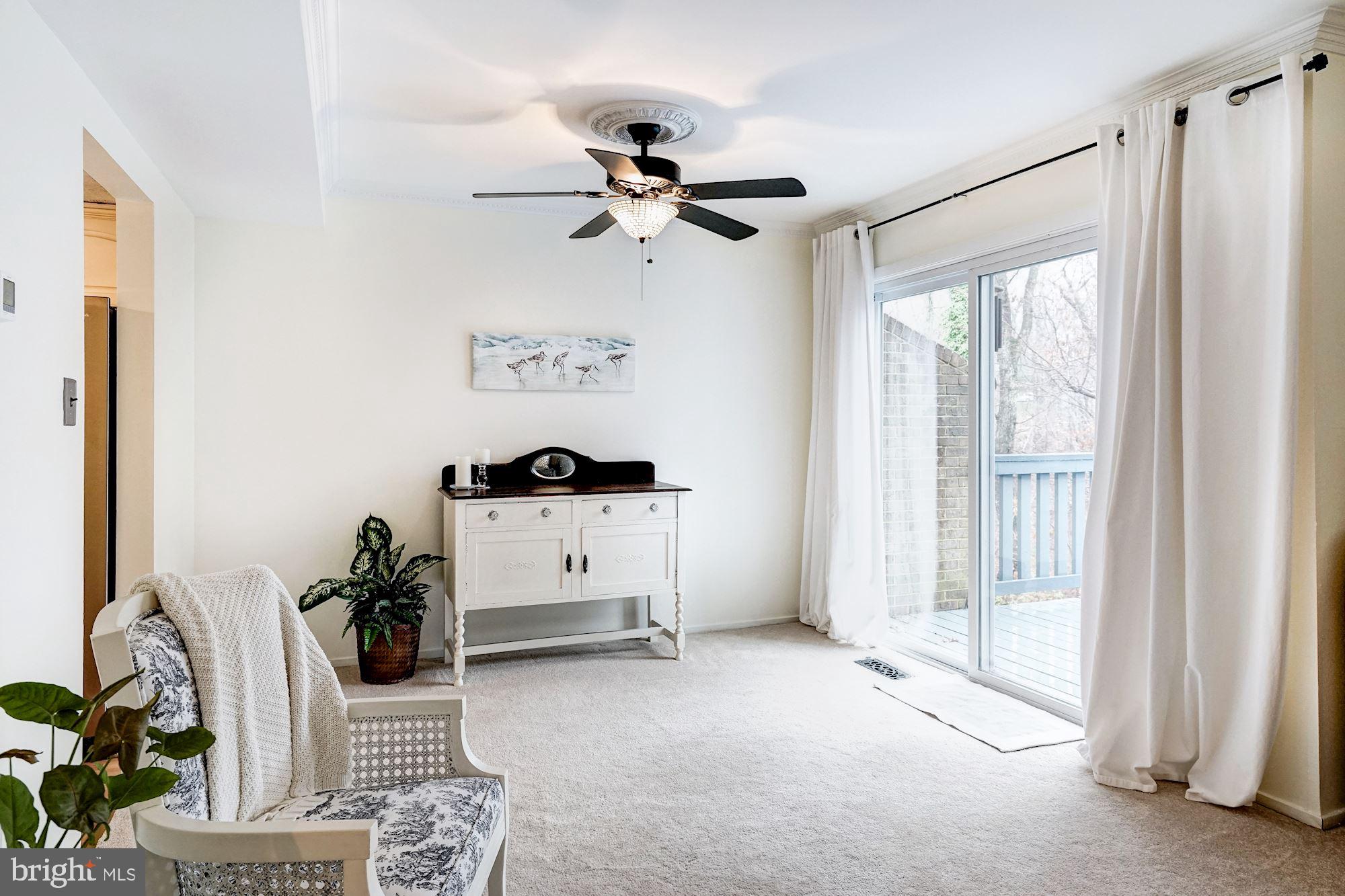 8552 Gwynedd Way Springfield, VA 22153 - Photo 8 of 37 Living room with access to deck/balcony