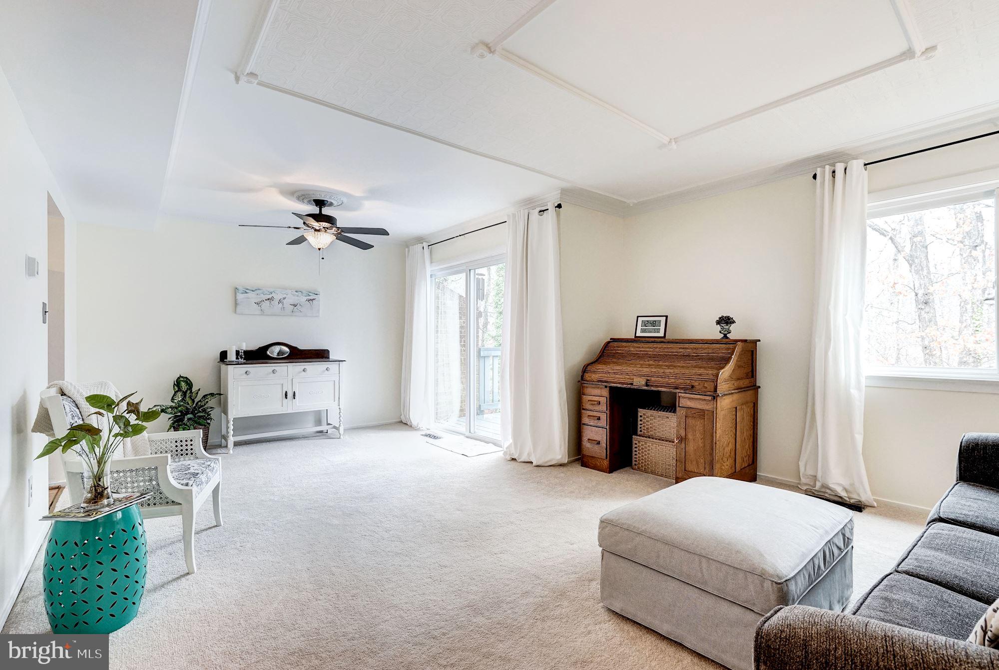 8552 Gwynedd Way Springfield, VA 22153 - Photo 9 of 37 Light filled living room with private balcony