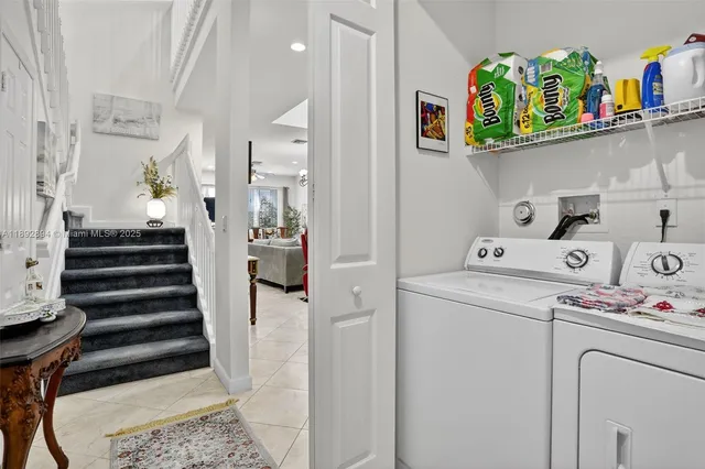 a utility room with dryer and washer