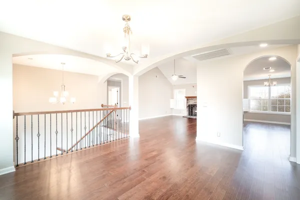 a view of a porch and wooden floor