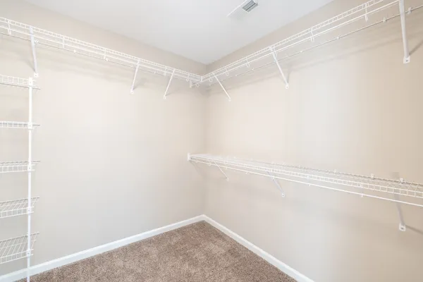 a view of a room with racks on the wall