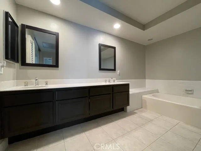 an empty room with wooden floor