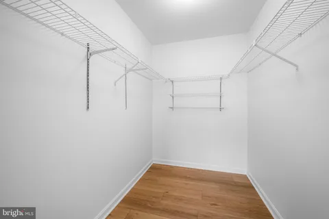 a view of a room with racks on the wall