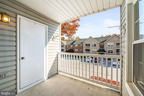 a view of a balcony with city view