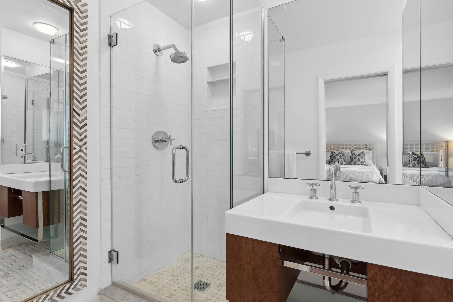 11 Fairview Road Montauk, NY 11954 - Photo 18 of 38 a bathroom with a sink a mirror and shower