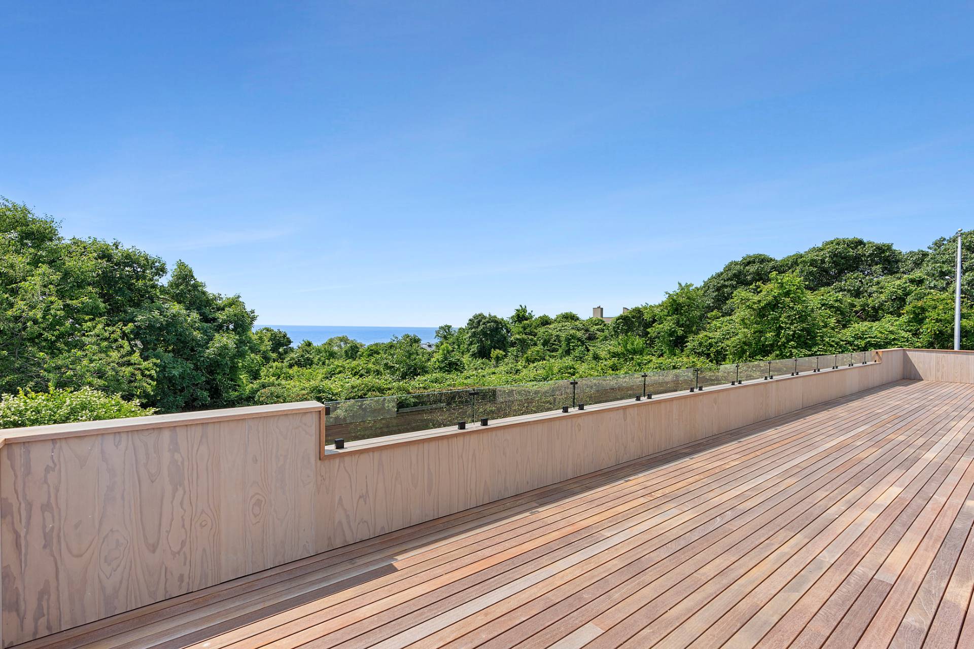 11 Fairview Road Montauk, NY 11954 - Photo 10 of 38 a view of a balcony and trees