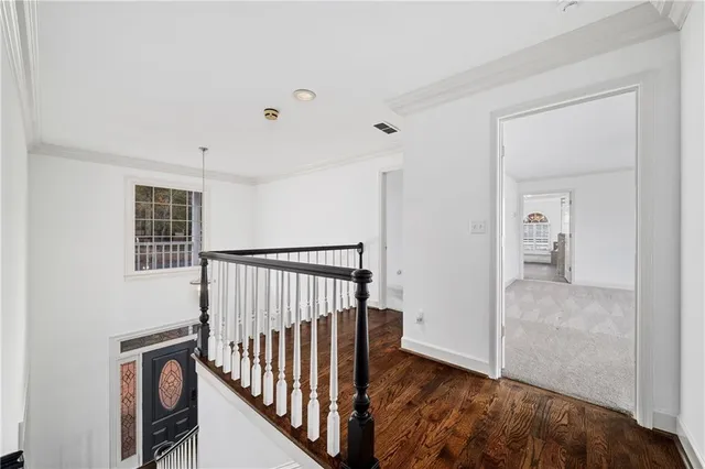 a spacious bedroom with a large bed and a couch