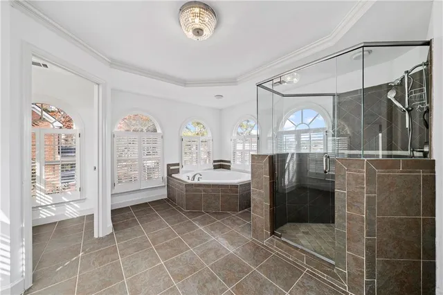 a bathroom with a double vanity sink a mirror and a shower