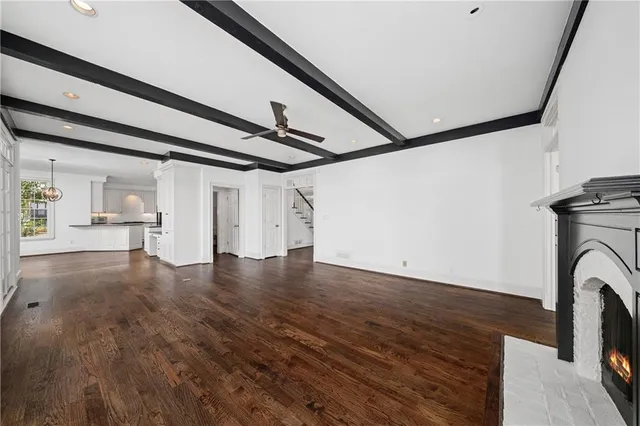 a view of a garage with wooden floor