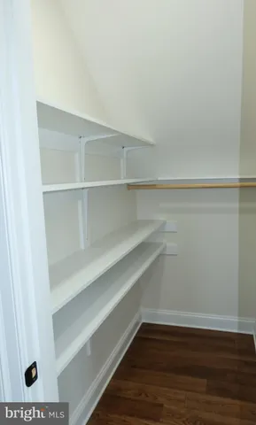 a view of small space with racks on the wall