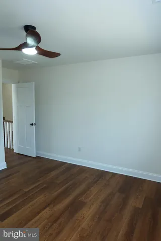 a bathroom with a shower a toilet and a shower