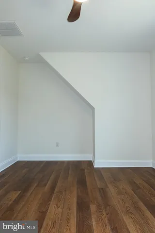 a utility room with cabinets washer and dryer