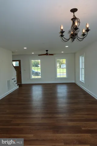 a kitchen with a sink and a window
