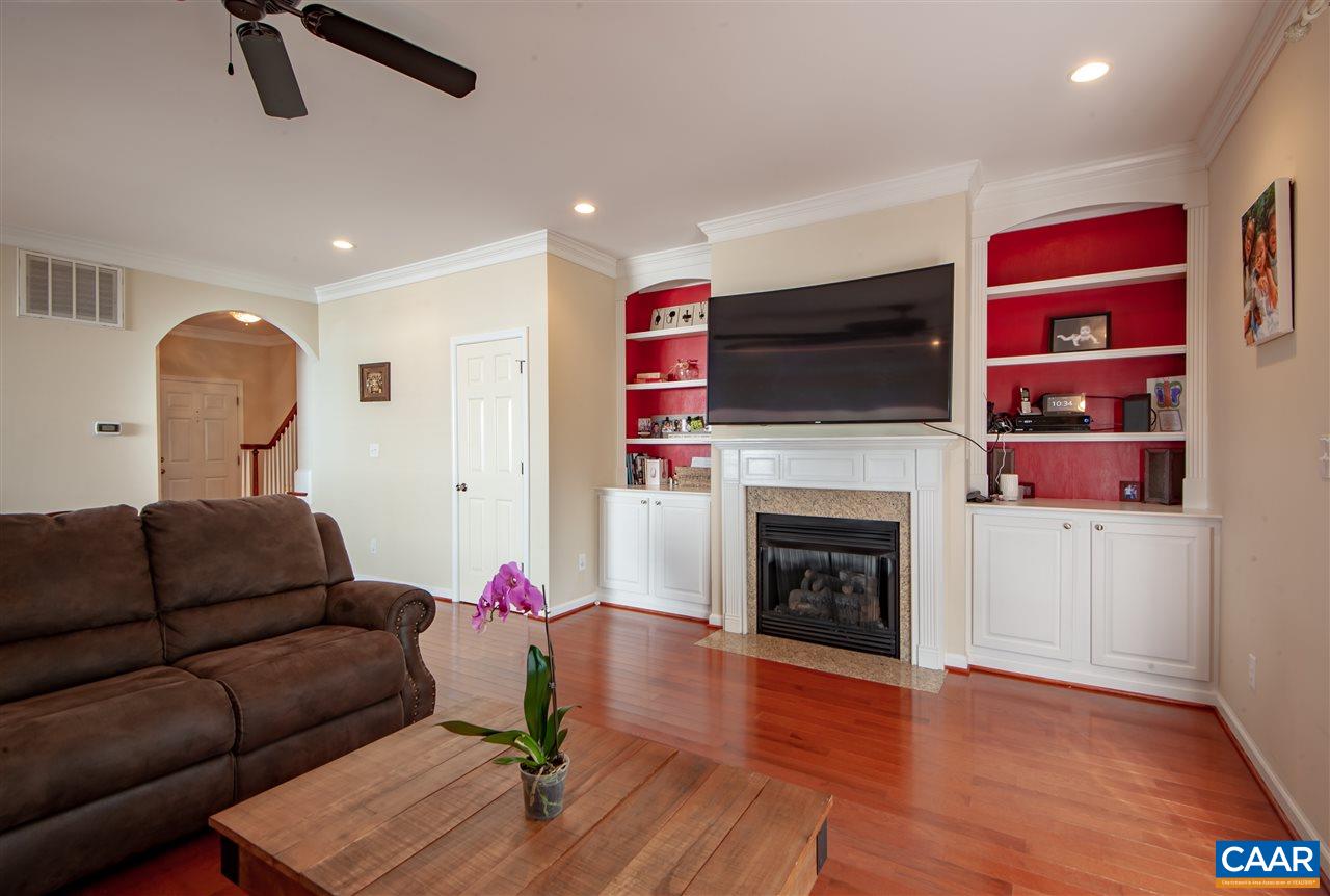 335 Quarry Road Charlottesville, VA 22902 - Photo 15 of 36 a living room with furniture fireplace and flat screen tv