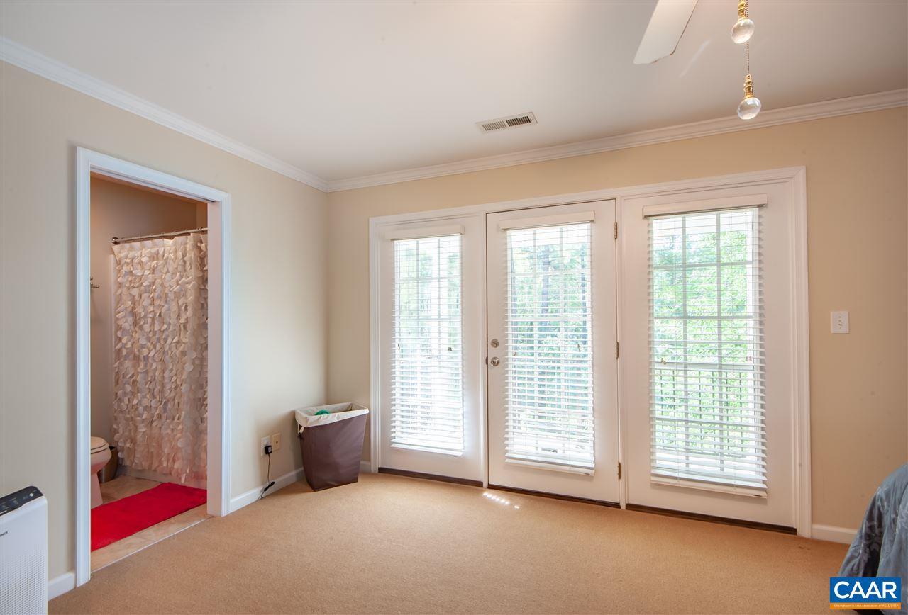335 Quarry Road Charlottesville, VA 22902 - Photo 18 of 36 a view of an empty room with a window