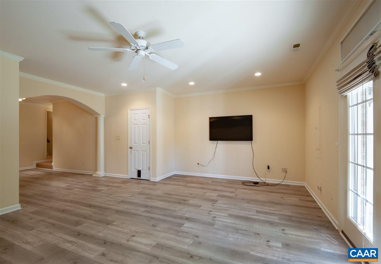 335 Quarry Road Charlottesville, VA 22902 - Photo 29 of 36 wooden floor in an empty room with a window