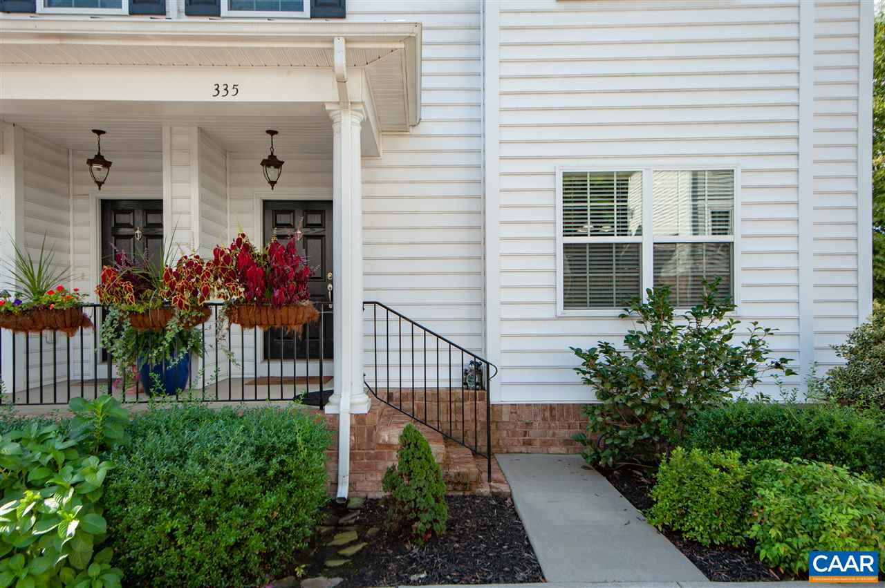 335 Quarry Road Charlottesville, VA 22902 - Photo 4 of 36 a front view of a house with a garden