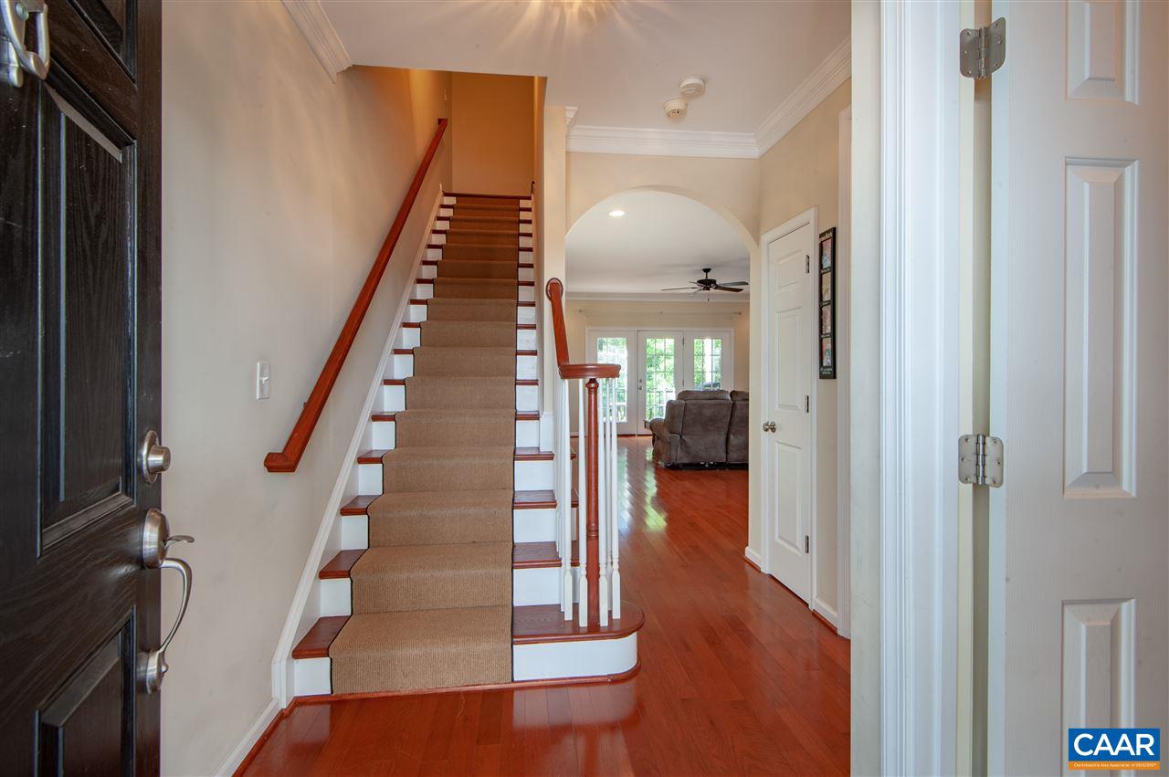 335 Quarry Road Charlottesville, VA 22902 - Photo 6 of 36 a view of entryway and hall with wooden floor