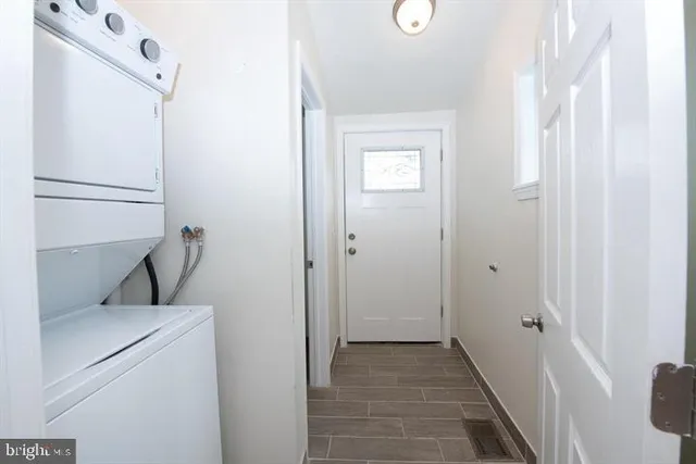a view of storage and utility room with washer and dryer