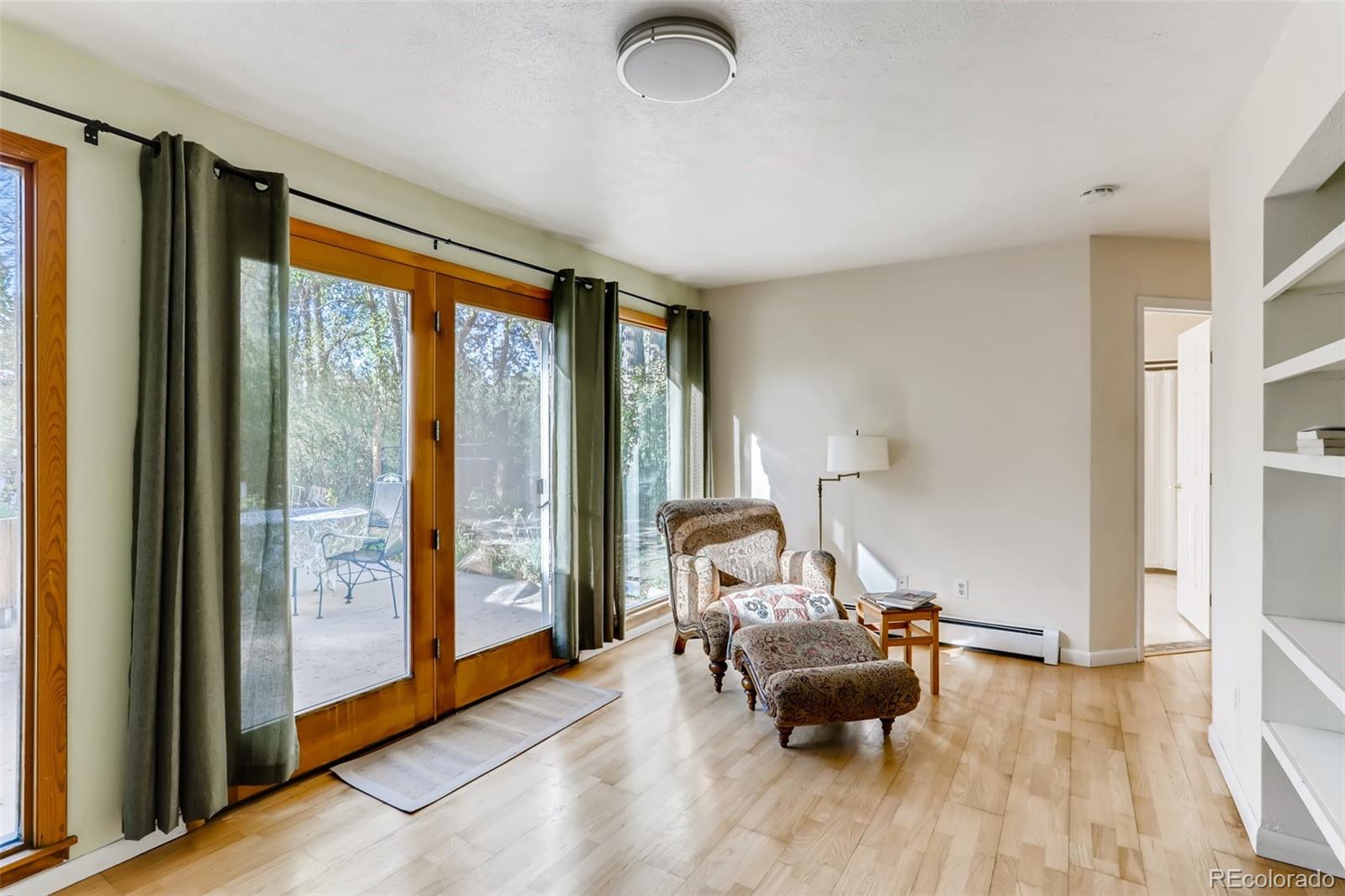 1521 Marshall Road Boulder, CO 80305 - Photo 12 of 40 a living room with furniture and a large window