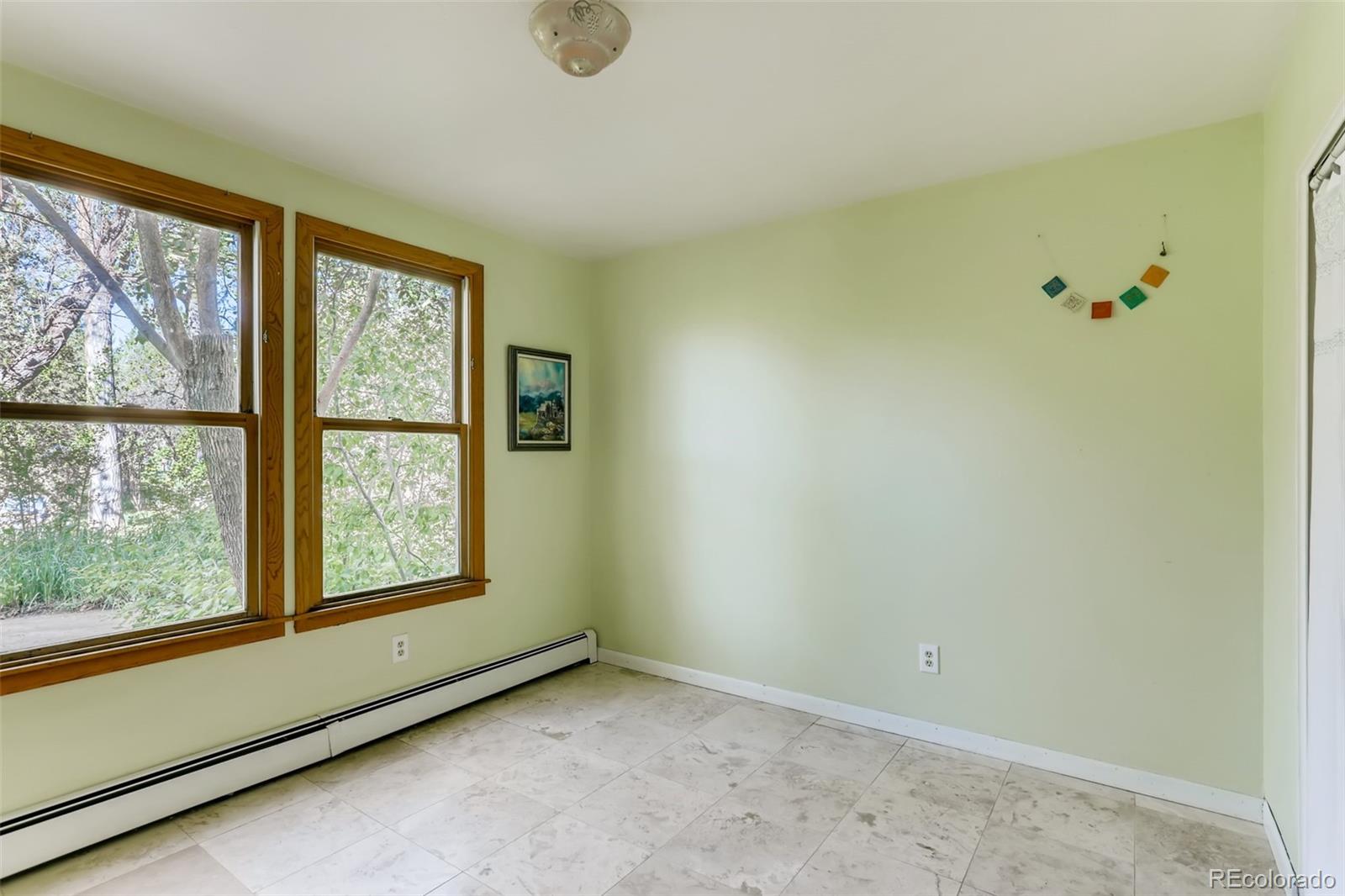 1521 Marshall Road Boulder, CO 80305 - Photo 19 of 40 an empty room with a window