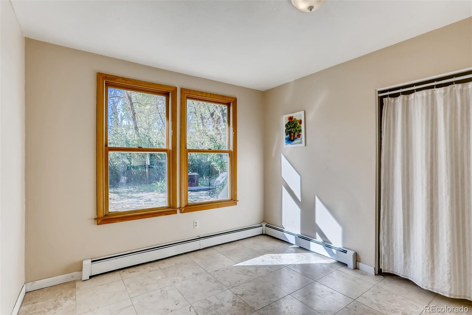 1521 Marshall Road Boulder, CO 80305 - Photo 20 of 40 a view of an empty room with a window